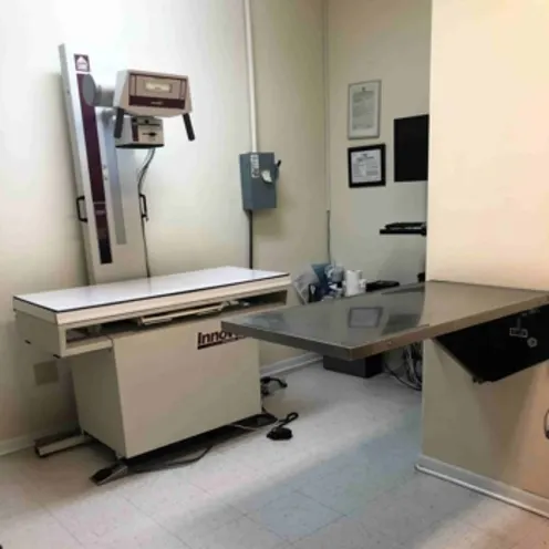 Shady Brook Animal Hospital's radiology room with an exam table for pets and various equipment